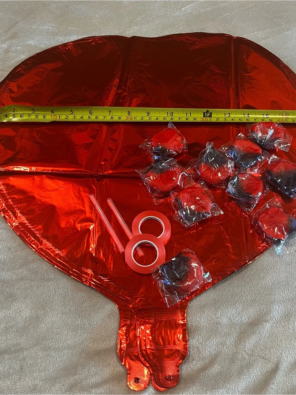 Love and Heart-Shaped Aluminum Foil Balloons, ribbon and rose petals